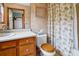 Bathroom with a tub, shower, vanity and sink at 209 Jungle Rd, Edisto Beach, SC 29438