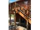 Exterior view of home with stairs, wooden support beams and outdoor space at 209 Jungle Rd, Edisto Beach, SC 29438