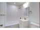 Bathroom featuring white subway tile, a shower-tub combo, and a white vanity at 2135 Clayton St, Charleston, SC 29414