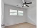 Bedroom featuring hardwood floors, white walls, natural light, and a ceiling fan at 2135 Clayton St, Charleston, SC 29414