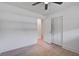 Bedroom showcasing hardwood floors, white trim, and a closet with paneled doors at 2135 Clayton St, Charleston, SC 29414
