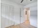 Bedroom with wood floor and a closet featuring louvered doors at 2135 Clayton St, Charleston, SC 29414