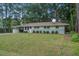 Charming single story house with manicured lawn and updated facade at 2135 Clayton St, Charleston, SC 29414