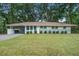 Charming single story house with manicured lawn and updated facade at 2135 Clayton St, Charleston, SC 29414