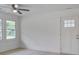 Bright living room featuring new windows and a doorway to the exterior at 2135 Clayton St, Charleston, SC 29414