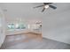 Open-concept living room with updated fixtures, white shiplap and a view of the kitchen at 2135 Clayton St, Charleston, SC 29414