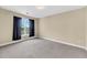 Spacious bedroom with neutral walls, carpeting, and a bright window view at 2244 Ashley Crossing Dr # 534, Charleston, SC 29414