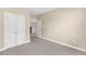 Carpeted bedroom with a double door closet, doorways to other rooms at 2244 Ashley Crossing Dr # 534, Charleston, SC 29414
