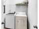 Laundry area with a side by side washer and dryer and shelving at 2244 Ashley Crossing Dr # 534, Charleston, SC 29414