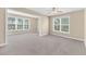 Bright open layout featuring large windows with a bonus sitting area and beige walls at 2244 Ashley Crossing Dr # 534, Charleston, SC 29414