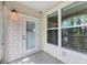 Covered patio featuring stylish tile, a glass door, and natural light at 2244 Ashley Crossing Dr # 534, Charleston, SC 29414