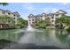 Scenic pond with a fountain provides a tranquil and picturesque setting for the surrounding community at 2244 Ashley Crossing Dr # 534, Charleston, SC 29414