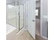 Bathroom features glass shower, soaking tub, and linen closet at 228 Donatella Dr, Goose Creek, SC 29445