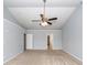 Bedroom with neutral walls, plush carpet, vaulted ceiling and ceiling fan at 228 Donatella Dr, Goose Creek, SC 29445