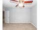 Spacious bedroom boasts neutral walls and carpet, with a ceiling fan at 228 Donatella Dr, Goose Creek, SC 29445