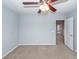 Bedroom features a ceiling fan, carpet, and walk-in closet at 228 Donatella Dr, Goose Creek, SC 29445