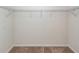 Spacious walk-in closet with wire shelving and carpet flooring at 228 Donatella Dr, Goose Creek, SC 29445