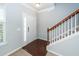 Entryway with hardwood floors, staircase, and neutral paint, creating a welcoming atmosphere at 228 Donatella Dr, Goose Creek, SC 29445