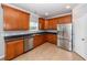 Kitchen boasts stainless steel appliances, dark countertops, and plenty of cabinet storage space at 228 Donatella Dr, Goose Creek, SC 29445