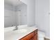 Bathroom sink with a modern faucet, vanity and toilet at 230 Darcy Ave, Goose Creek, SC 29445