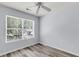 Bright bedroom with a large window providing natural light and a view of the outdoors at 230 Darcy Ave, Goose Creek, SC 29445