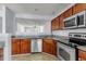 Kitchen featuring granite counters, wood cabinets and stainless steel appliances at 230 Darcy Ave, Goose Creek, SC 29445