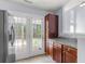 Bright kitchen with stainless steel appliances, granite counters and a door to backyard at 230 Darcy Ave, Goose Creek, SC 29445