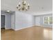 Bright living room with hardwood floors and chandelier at 230 Darcy Ave, Goose Creek, SC 29445