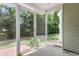 Screened in porch with views to the backyard and access to the house via sliding glass doors at 230 Darcy Ave, Goose Creek, SC 29445