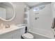 A full bathroom with a white vanity, toilet and bathtub with white subway tile surround at 261 Mossy Oak Way, Mount Pleasant, SC 29464