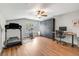 A bonus room with an exercise area, built in storage cabinets, desk space and laminate flooring at 261 Mossy Oak Way, Mount Pleasant, SC 29464