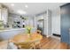 Modern kitchen features stainless steel appliances and cozy breakfast nook at 261 Mossy Oak Way, Mount Pleasant, SC 29464