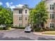 Exterior view of multi-story building with a private parking space and landscaped grounds at 2632 Egret Crest Ln, Charleston, SC 29414