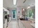 Modern kitchen with white cabinets, sleek appliances, and a breakfast bar at 2632 Egret Crest Ln, Charleston, SC 29414