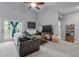 Cozy living room with modern furnishings and access to an outdoor balcony at 2632 Egret Crest Ln, Charleston, SC 29414