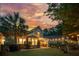 Private backyard featuring a patio, a garden, landscape lighting and mature trees at 2900 Split Hickory Ct, Johns Island, SC 29455