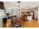 Open-concept living area showcases hardwood floors, spacious layout, and seamless flow to kitchen at 2900 Split Hickory Ct, Johns Island, SC 29455