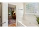 Main bathroom with soaking tub and bedroom view at 2900 Split Hickory Ct, Johns Island, SC 29455