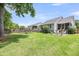 Lovely backyard featuring a patio, large grassy space, and a garden plot at 3061 Penny Ln, Johns Island, SC 29455