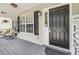 Close up of front porch with chairs and view of front door at 3061 Penny Ln, Johns Island, SC 29455