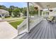 Inviting front porch with hanging flower baskets and neighborhood views at 3061 Penny Ln, Johns Island, SC 29455