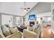 Comfortable living room with vaulted ceiling and open access to kitchen at 3061 Penny Ln, Johns Island, SC 29455