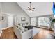 View of the living room with hardwood floors, vaulted ceiling and comfortable furniture at 3061 Penny Ln, Johns Island, SC 29455