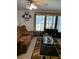 Comfortable living room with plush brown seating, natural light, and a welcoming atmosphere at 307 Glen St, Summerville, SC 29483