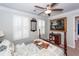 Well-lit bedroom with ceiling fan and plantation shutters, a comfortable sleep space at 3092 Morningdale Dr, Mount Pleasant, SC 29466