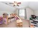 Bright bedroom with a playful bunk bed, slide, and ceiling fan at 3092 Morningdale Dr, Mount Pleasant, SC 29466