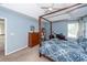 Comfortable bedroom with ceiling fan, 4 poster bed and desk, perfect for relaxation and productivity at 3092 Morningdale Dr, Mount Pleasant, SC 29466