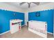 Brightly painted bedroom featuring a daybed, and a white crib at 3092 Morningdale Dr, Mount Pleasant, SC 29466