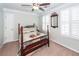 Well-lit bedroom with ceiling fan and plantation shutters, creating a cozy atmosphere at 3092 Morningdale Dr, Mount Pleasant, SC 29466