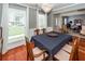 Dining room features chandelier lighting, hardwood floors, and large windows at 3092 Morningdale Dr, Mount Pleasant, SC 29466